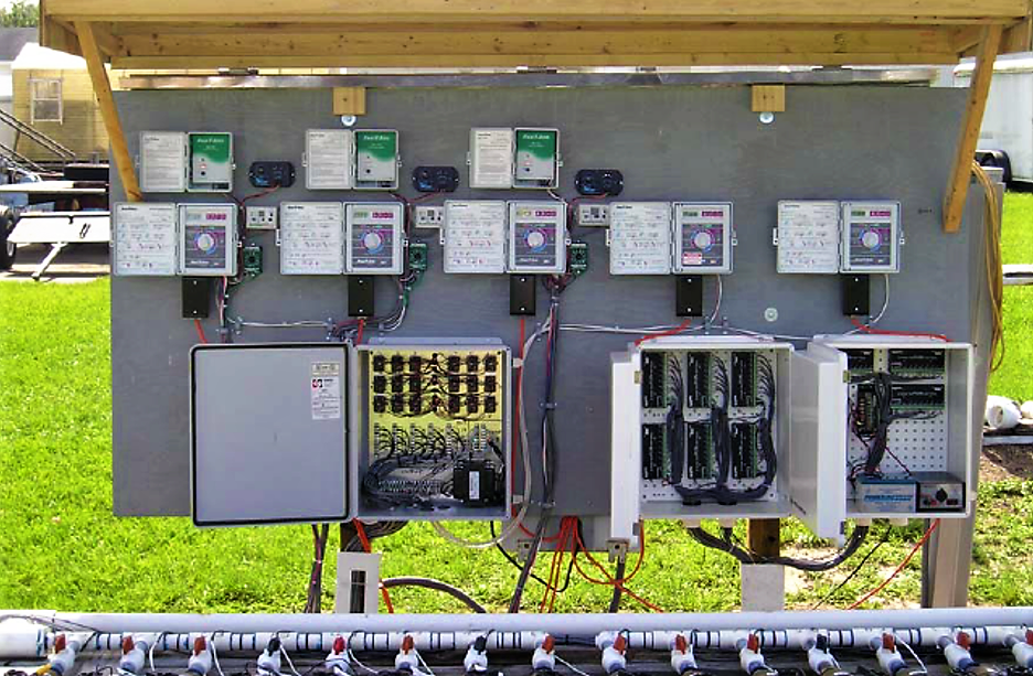 Control board showing timers, soil moisture sensor-controllers, solenoid valves wiring, and flowmeters-datalogger. Source: CARDENAS-LAILHACAR (2006) 
